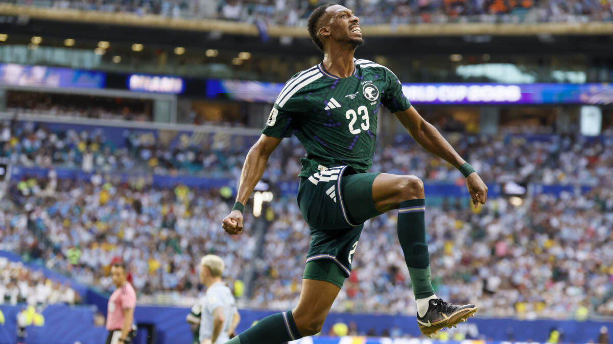 Saudi Arabia midfielder Mohamed Kanno (23) reacts after Abdulelah al-Amri (4) scores against Uruguay during the FIFA World Cup opening match at Miami Stadium on Monday, June 15, 2026. Saudi Arabia midfielder Mohamed Kanno (23) reacts after Abdulelah al-Amri (4) scores against Uruguay during the FIFA World Cup opening match at Miami Stadium on Monday, June 15, 2026.